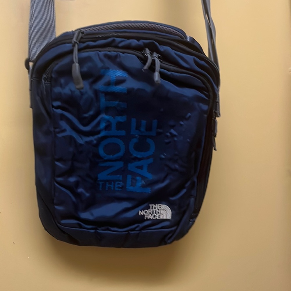 North face sling bag black & blue